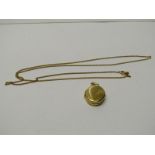9CT YELLOW GOLD LOCKET, weighing approximately 3.8 grms, with yellow metal chain