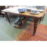 EDWARDIAN MAHOGANY EXTENDING TABLE, D-end with tapering fluted legs with castors, 41" width 59"