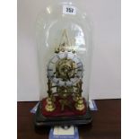 SKELETON CLOCK, glass domed brass skeleton clock, 11" height