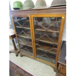 GEORGIAN DESIGN MAHOGANY GLAZED TWIN DOOR BOOKCASE, fluted pediment with glazing in the