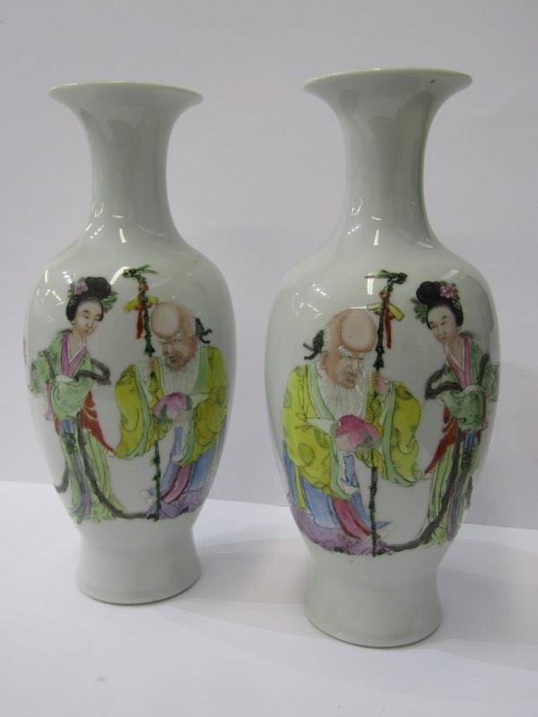 ORIENTAL CERAMICS, pair of Famille Rose 10" oviform vases, decorated with Sage with Courtesan, 4