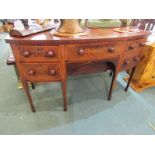 LATE GEORGIAN CROSS BANDED MAHOGANY BOW FRONT KNEEHOLE SIDEBOARD, of 4 drawers with wooden knop