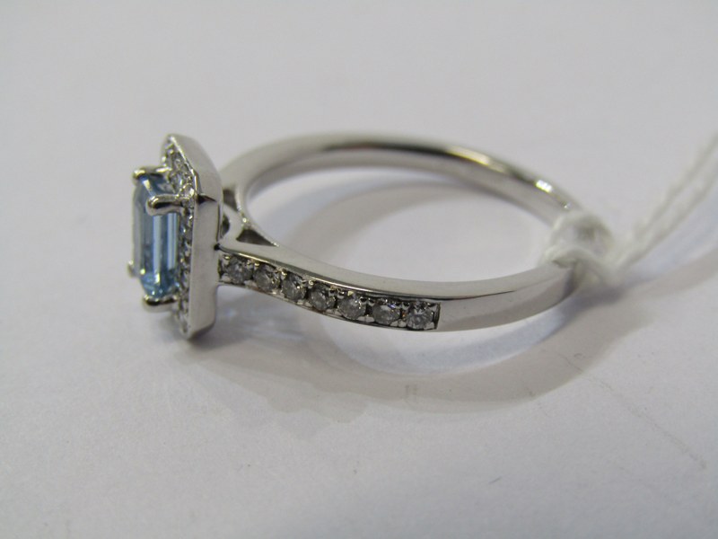 18CT WHITE GOLD AQUAMARINE & DIAMOND CLUSTER RING, principal rectangular cut aquamarine of good - Image 2 of 3