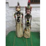 VINTAGE INDONESIAN PUPPETS, 2 vintage Indonesian puppets on stands, 27" height