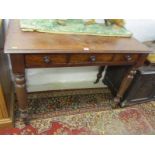 VICTORIAN MAHOGANY TRIPLE DRAWER DESK, original wood knop handles and tapering turned legs with