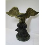 BRONZE EAGLE, circular marble base gilded Eagle on rocky outcrop, 10" height