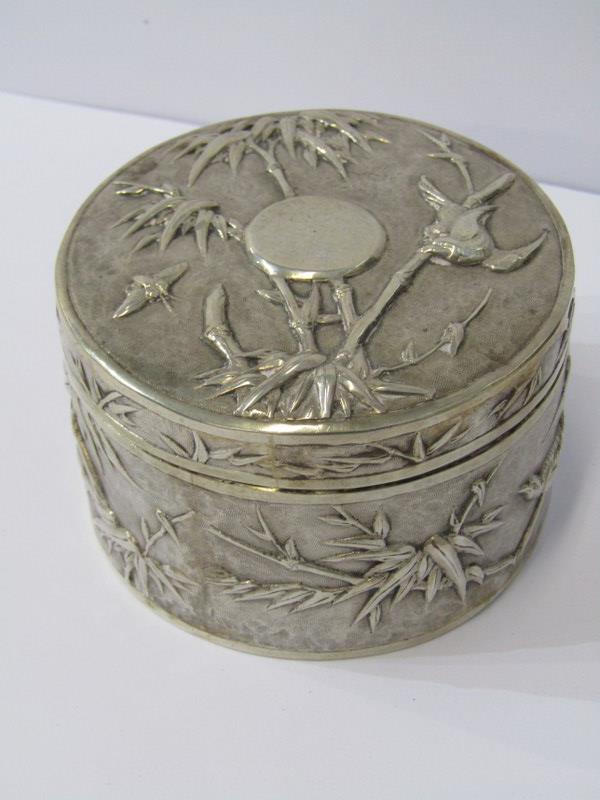 CHINESE SILVER LIDDED CANISTER decorated birds, bugs and bamboo stork and leaf pattern in relief,