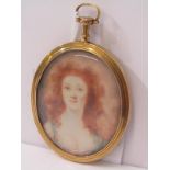 DOUBLE SIDED GOLD FRAMED PICTURE LOCKET with miniature of Young Lady, to the reverse her hair behind