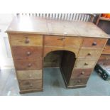 VICTORIAN KNEEHOLE OAK CLERK'S DESK, with twin pedestal of 10 drawers with original knop handles and