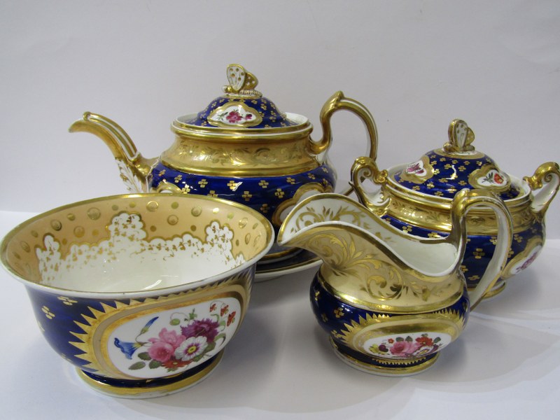 REGENCY RIDGWAY, gilded porcelain tea service, Royal Blue ground with reserves of floral sprays,