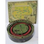 ANTIQUE FRENCH TIN PLATE MECHANICAL HORSE RACING GAME, 10" diameter, together with the French Gaming