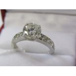 PLATINUM SET DIAMOND SOLITIAIRE RING, principal transitional brilliant cut diamond of good colour