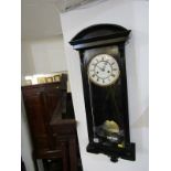 REGULATOR CLOCK, ebonised case narrow bodied regulator clock with enamelled face, 33" height