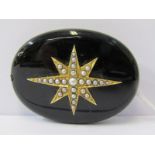MOURNING JEWELLERY, black gold star set mourning brooch with vacant picture frame to rear, gold star