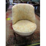 UPHOLSTERED TUB DESIGN DRESSING CHAIR with swivel circular base on cabriole legs