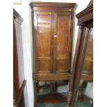 PROVINCIAL GEORGIAN MAHOGANY CORNER CUPBOARD, twin panelled doors, fitted interior and later shelf