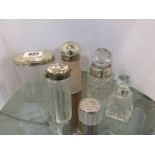 SILVER TOPPED SCENT BOTTLES, collection of 6 scent and powder bottles, 2 silver topped scent