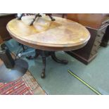 VICTORIAN BURR WALNUT MARQUETRY BREAKFAST TABLE, oval tilt top on 4 column support and carved scroll