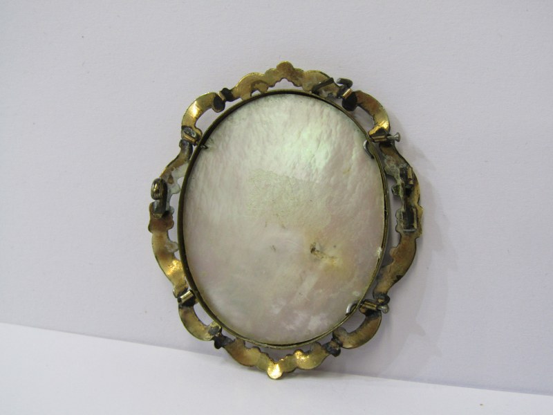 19th CENTURY PORTRAIT MINIATURE OF A YOUNG WOMAN on oval mother-of-pearl plaque in a foliate - Image 2 of 2
