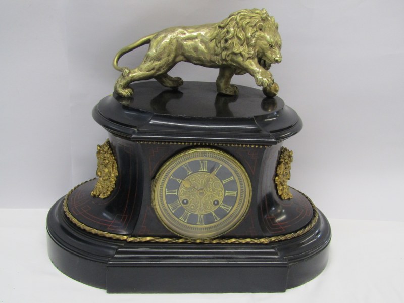 VICTORIAN MANTEL CLOCK, black marble lion crested mantel clock with French striking movement