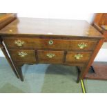 PROVINCIAL GEORGIAN OAK LOW BOY, single long drawer above 3 short drawers, fretwork brass back