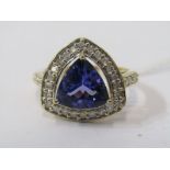 18ct YELLOW GOLD TANZANITE & DIAMOND RING, principal trillion cut tanzanite in excess of 2cts,