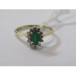 9ct YELLOW GOLD EMERALD & DIAMOND CLUSTER RING, principal oval cut emerald surrounded by brilliant