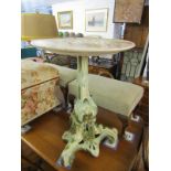 ORNATE POTTERY WINE TABLE, floral and foliate design base tripod wine table with floral painted dish