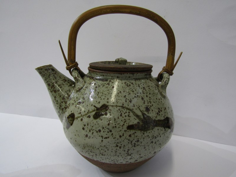 BERNARD LEACH POTTERY, glazed stonware teapot by Kenneth Quick, with cane handle and simple