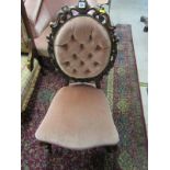 VICTORIAN SPOONBACK NURSING CHAIR, shell and foliate carved surround with serpentine fronted seat