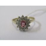 9ct YELLOW GOLD PINK SAPPHIRE & DIAMOND CLUSTER RING, principal oval cut pink sapphire surrounded by
