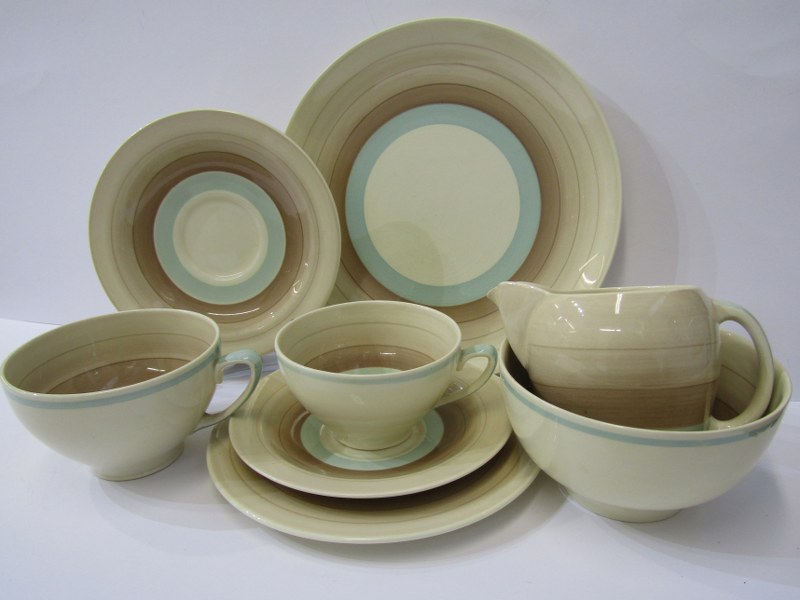 SUSIE COOPER, brown banded tea service of cream jug, sugar bowl, bread plate, 5 small cup trios, 2