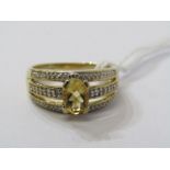 9CT YELLOW GOLD CITRINE & DIAMOND RING, principal oval cut citrine in 4 claw setting, set with