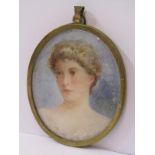 EDWARDIAN OVAL PORTRAIT MINIATURE, "Young Lady" in double glazed pendant, 3.25" height