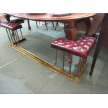 ANTIQUE CLUB FENDER, red leather button upholstered seats on brass column supports, 67" width