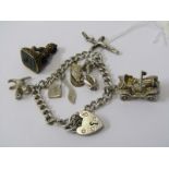 SILVER CHARM BRACELET WITH CHARMS & YELLOW METAL FOB, with intaglio carved lion rampant in