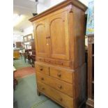19TH CENTURY OAK LINEN PRESS, twin panelled arch doors with 4 short drawer facades above chest