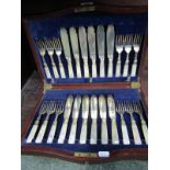CUTLERY, mahogany cased 12 pairs of mother-of-pearl handled fish eaters