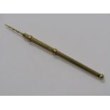 9ct YELLOW GOLD PROPELLING CIGAR PIERCER, approx 6 grms in weight