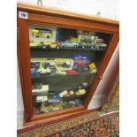 MODEL CARS, mahogany glazed display case containing assorted diecast model vehicles, some in