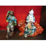 ORIENTAL CERAMICS, 19th Century Japanese figure group of Deity sat on kylin, 10" height; together