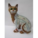 GALLE CAT, faience seated Cat decorated with striped jacket and green glass inset eyes (slight