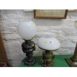 OIL LAMPS, Edwardian ornate brass base oil lamp supported by 3 caryatid with milk glass shade;