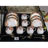 ROYAL CROWN DERBY, cased set of 6 "Japan" pattern tea cups and saucers with silver spoons, pattern