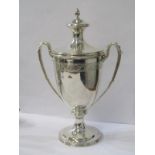 SILVER LIDDED TROPHY GOBLET, with twin handles and acanthus leaf decoration, with foliate border