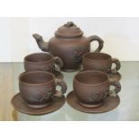 ORIENTAL CERAMICS, Chinese Yixing part tea service of tea pot with 4 crabstock handled cups and