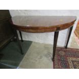 GEORGIAN MAHOGANY HALL TABLE, demi-lune hall table on tapering square section legs, radial venered