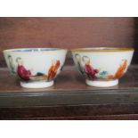 ORIENTAL CERAMICS, pair of 18th Century Chinese tea bowls "Figures within a garden setting"