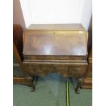 QUEEN ANNE BUREAU, cross banded walnut ladies bureau with 3 short drawers and carved scroll legs,