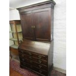 PROVINCIAL GEORGIAN OAK BUREAU/BOOKCASE, 4 graduated drawers with shaped brass backplate, swan